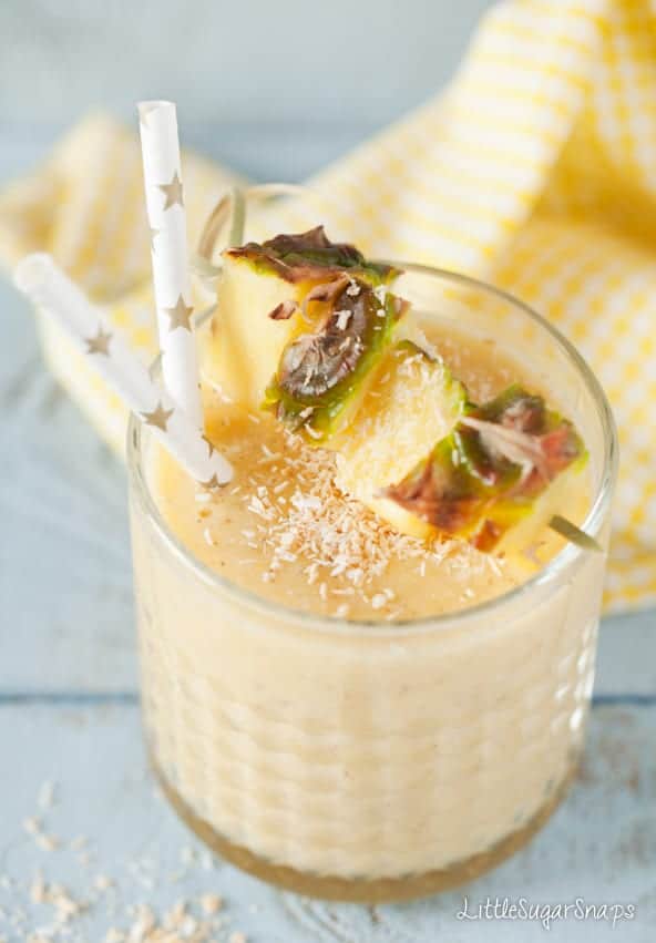 Pineapple coconut cold busting smoothie with chunks of fresh pineapple