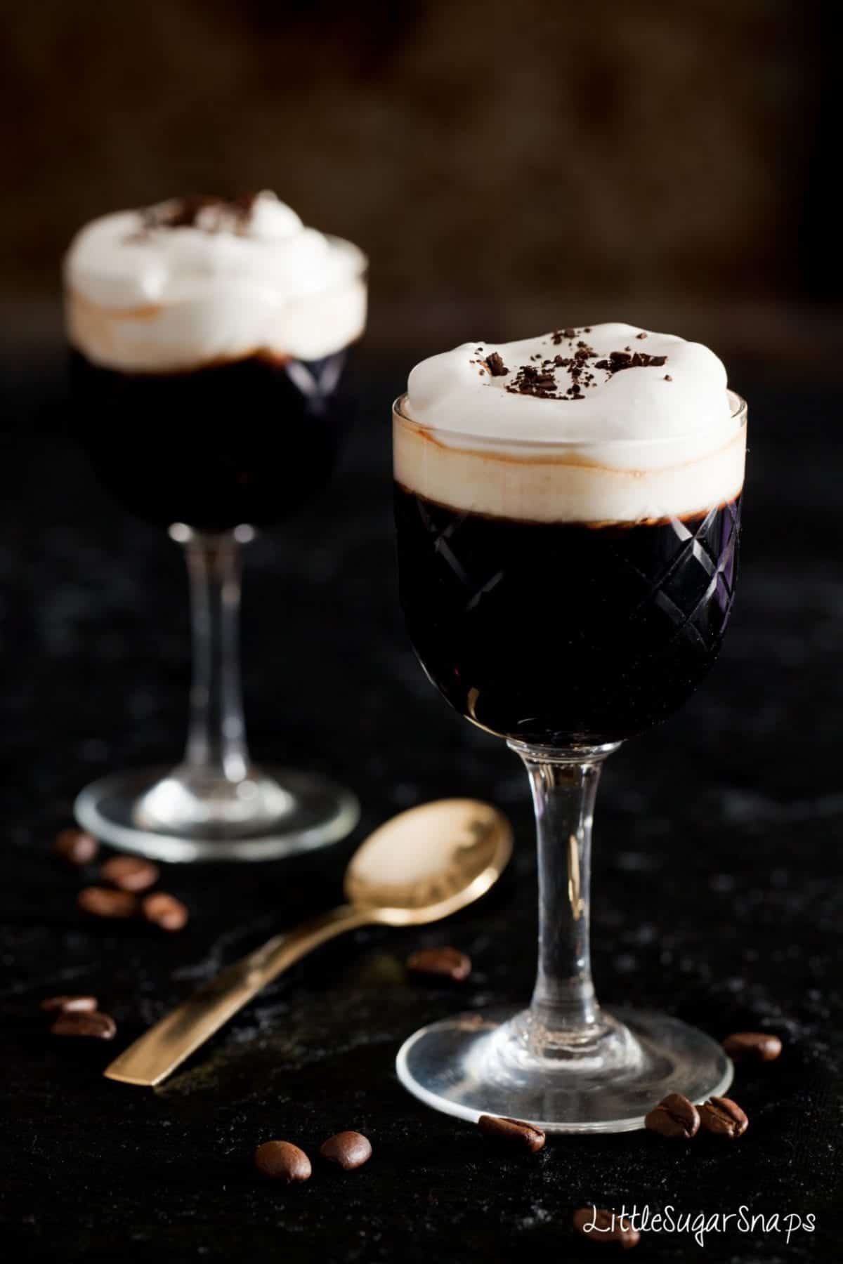 Coffee with Blackcurrant & Almond Cold coffee drink topped with softly whipped cream and chocolate flakes