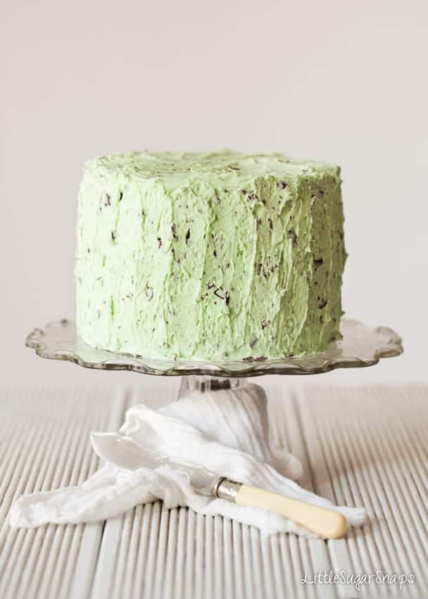 Mint-Choc-Chip Layer Cake with green buttercream on a cakestand