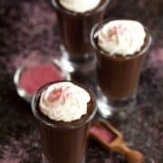 Prosecco Truffle Chocolate dessert topped with whipped cream and sprinkled with pink sugar served in glasses