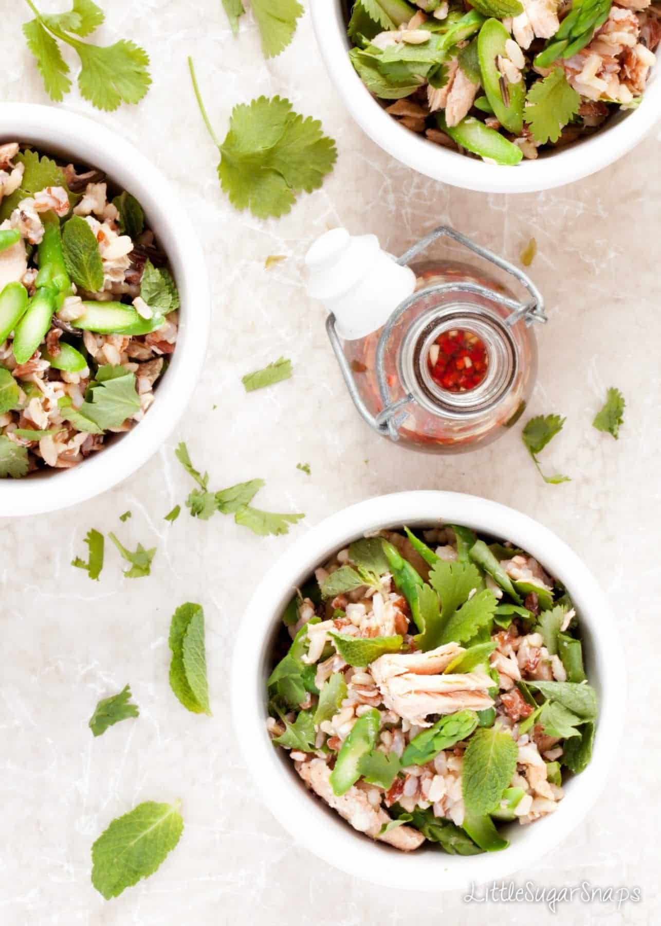 salmon rice bowls with rice, asparagus, thai dressing coriander & mint