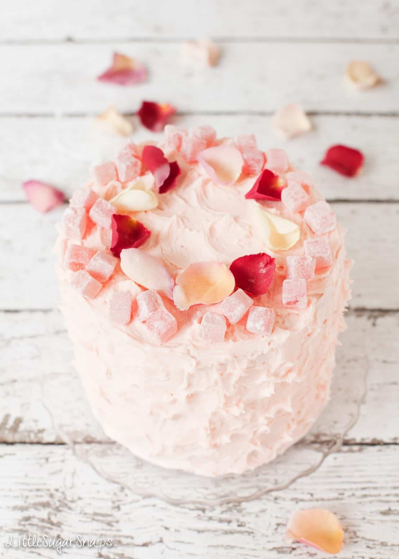 Pink layer cake decorated with Turkish Delight & rose petals