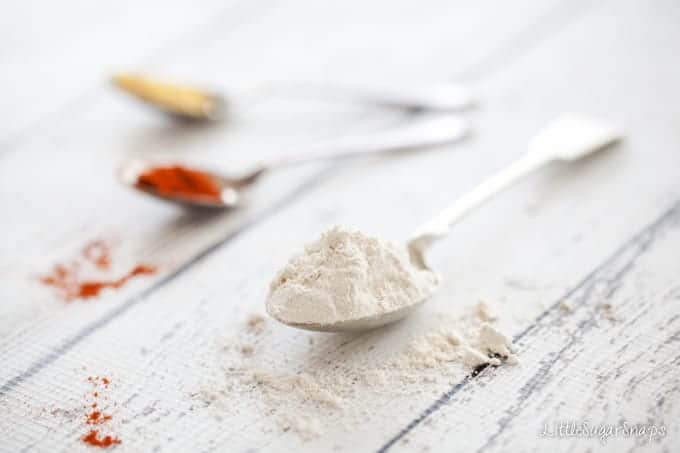 Ingredients on a tabletop - spelt flour, paprika and mustard powder