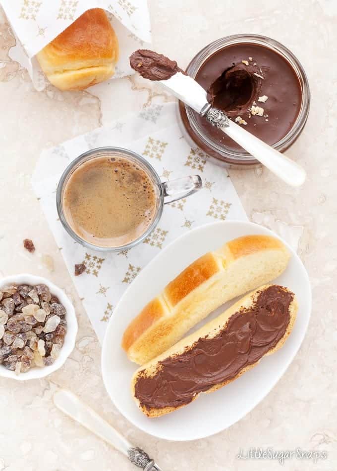 Brioche rolls, chocolate spread and espresso coffee
