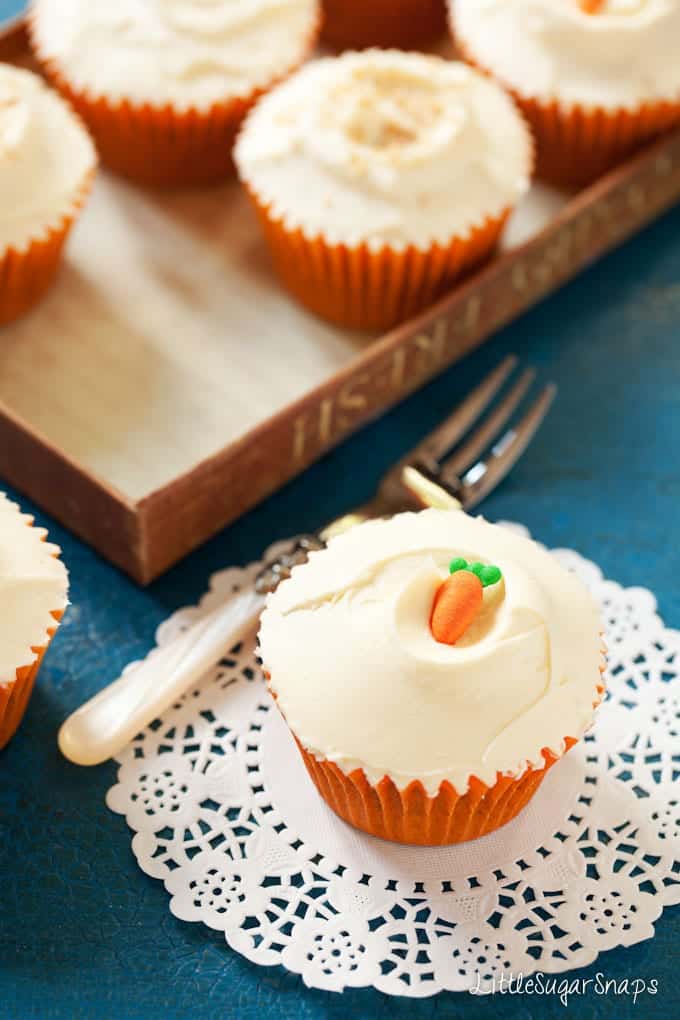 Carrot cake cupcake with cream cheese buttercream and sugarcraft carrot