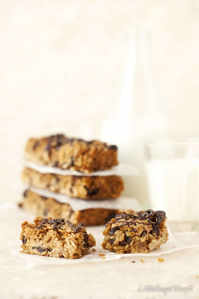 A slice of raisin oat bar split into two pieces