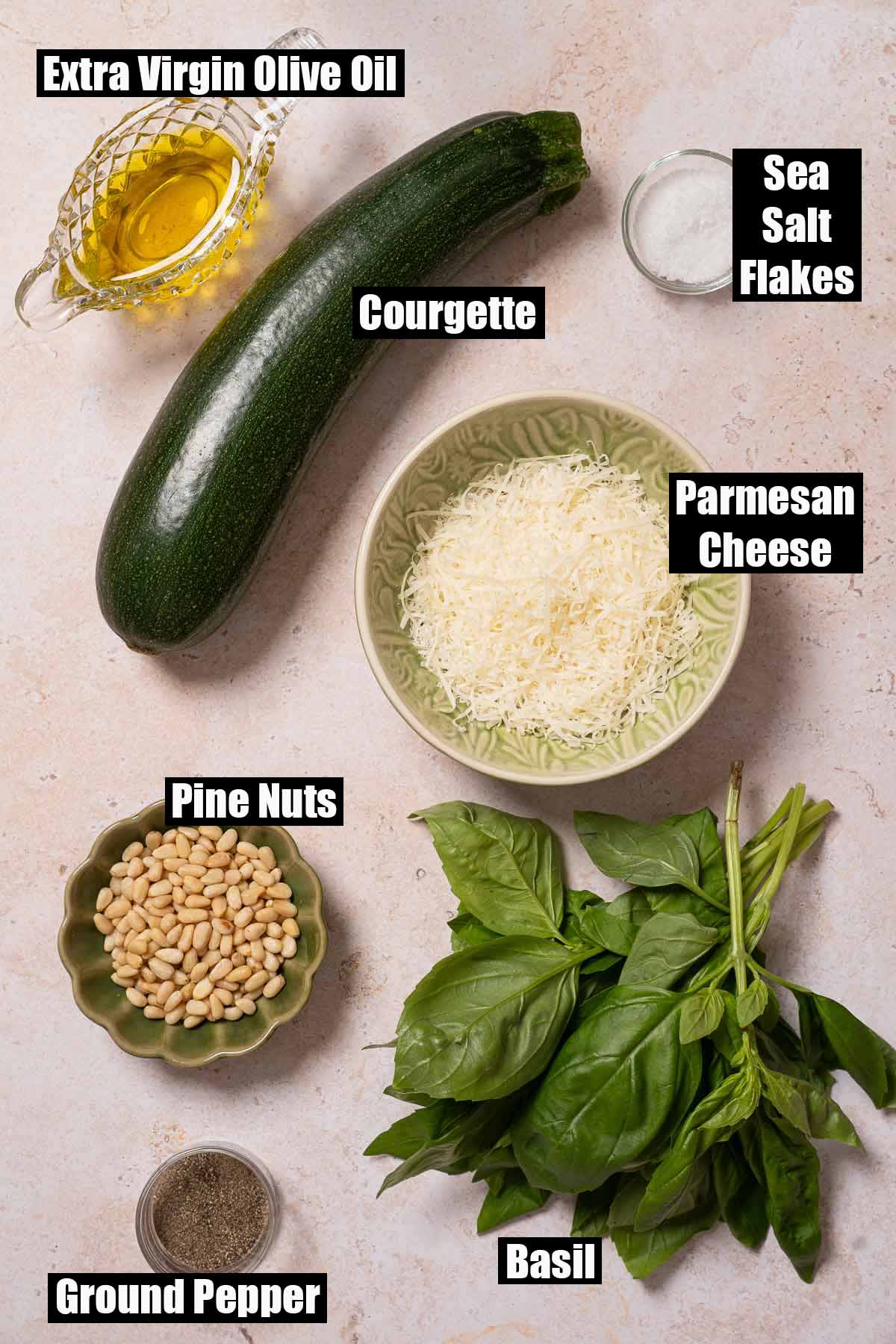 Labelled ingredients for raw courgette salad.
