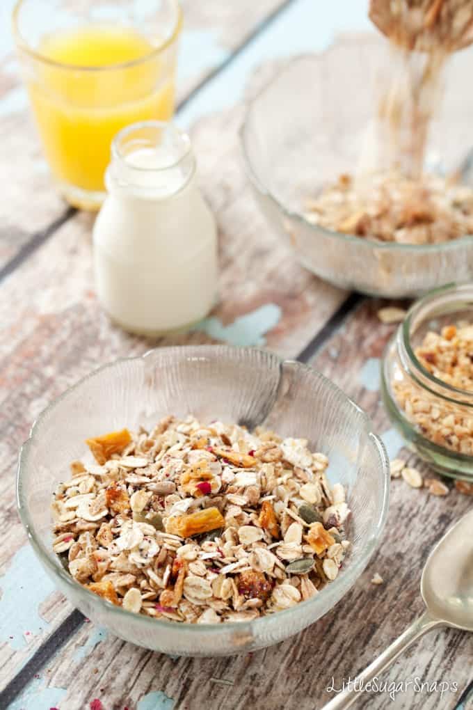 A bowl of homemade Muesli with a small bottle of milk