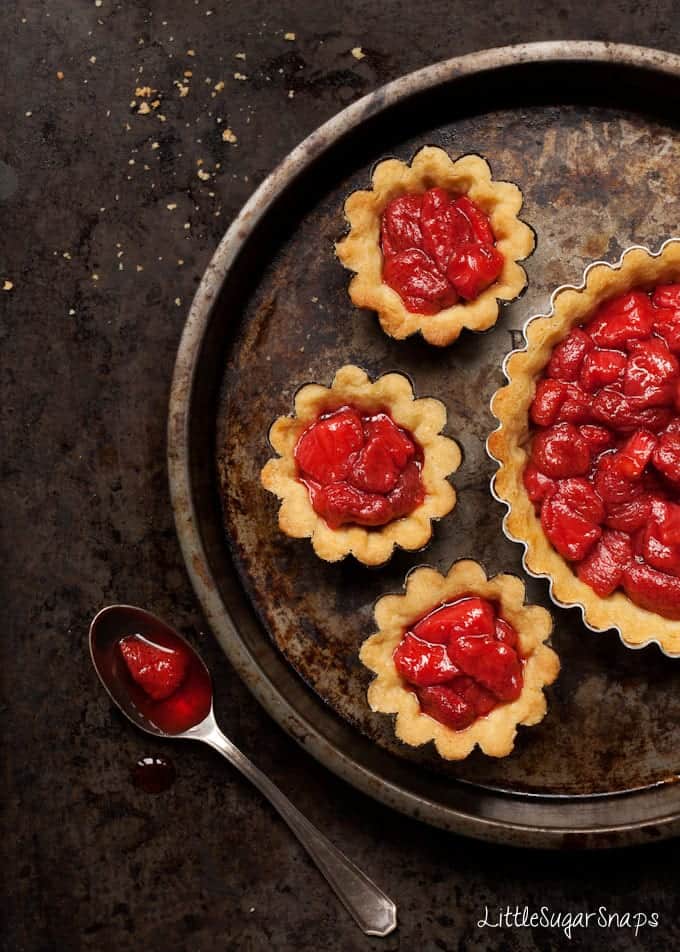 Pastry cases filled with strawberry sauce