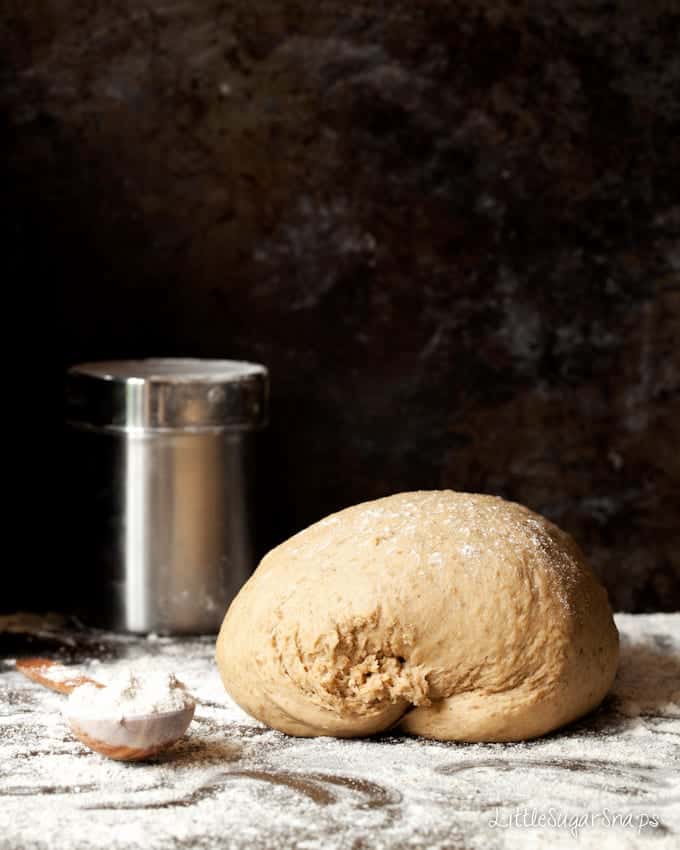 Dough for coffee bread  on a floured worktop.