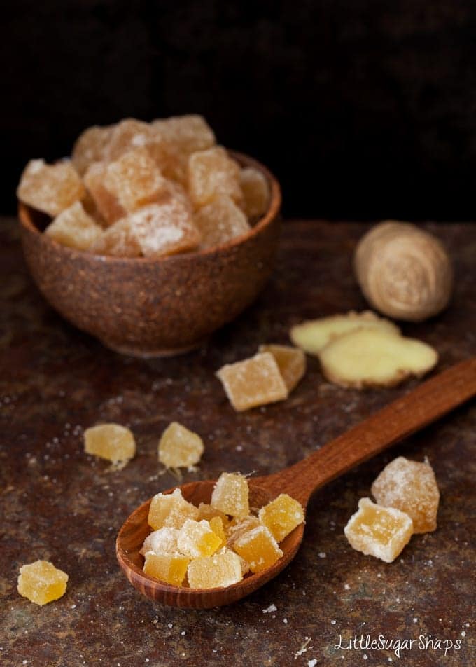 Crystalised ginger on a wooden spoon