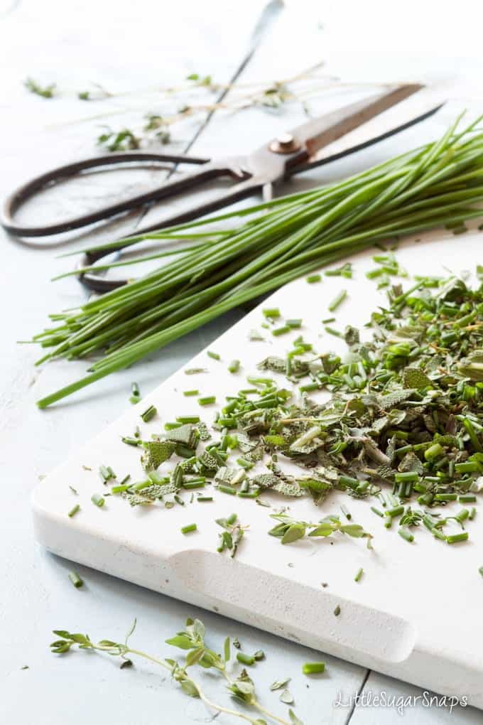 Mixed herbs on a chopping board