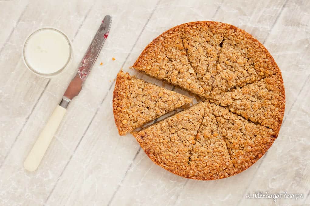 A circle of Peanut Butter Flapjack cut into 8 pieces