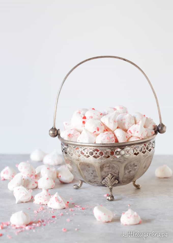 A vintage metal bowl of Peppermint Meringue kisses