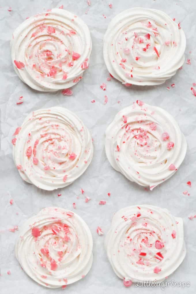 Swirls of meringue topped with crushed candy cane pieces