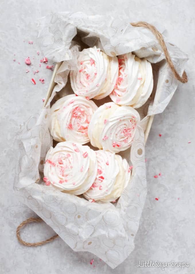 Chocolate Peppermint Meringue Sandwiches in a cardboard box