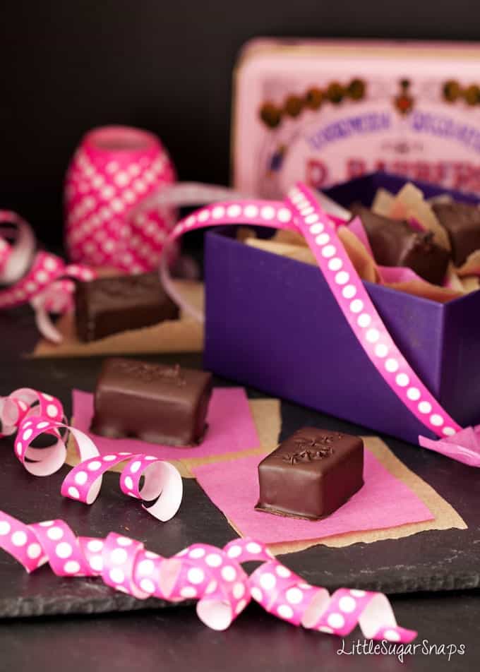 Chocolate Caramel Truffles being packed into a gift box