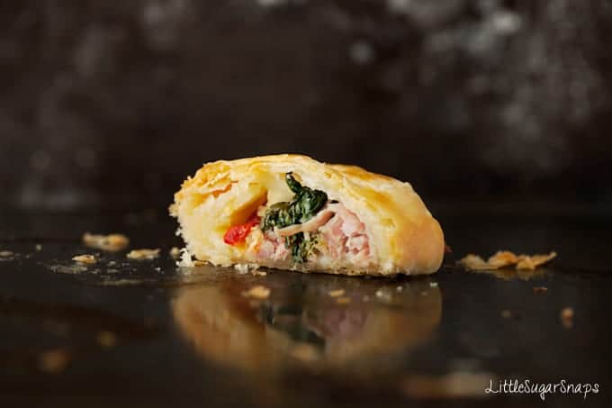 Cut open pastry roll filled with Spinach & Ham