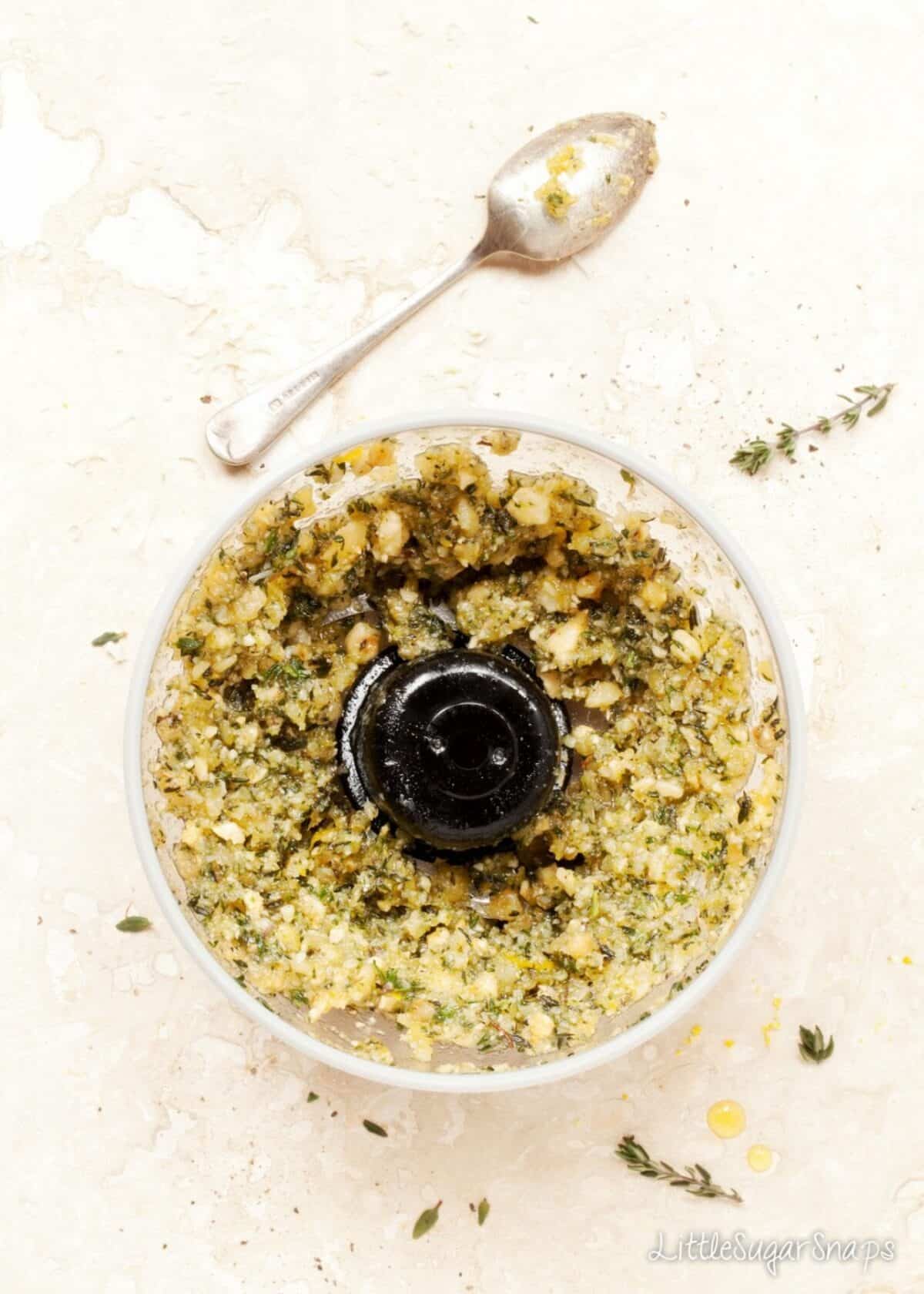 Hazelnut and thyme pesto freshly made in a food processor.