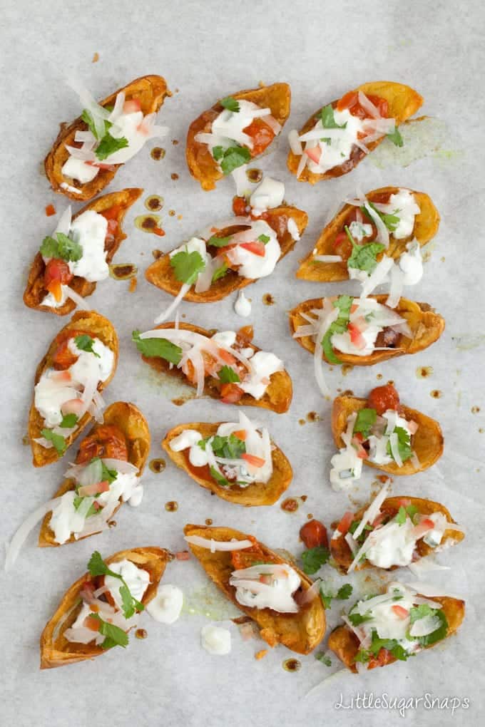 Potato skins filled with raita, mango chutney, onion salad and coriander