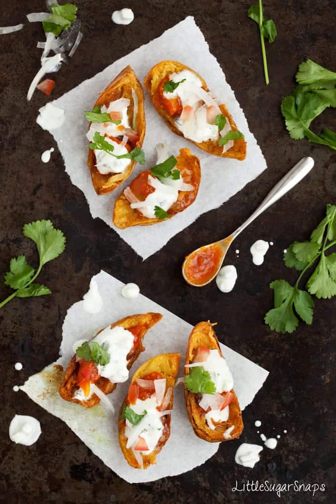 Potato skins with raita, onion salad, mango chutney & coriander