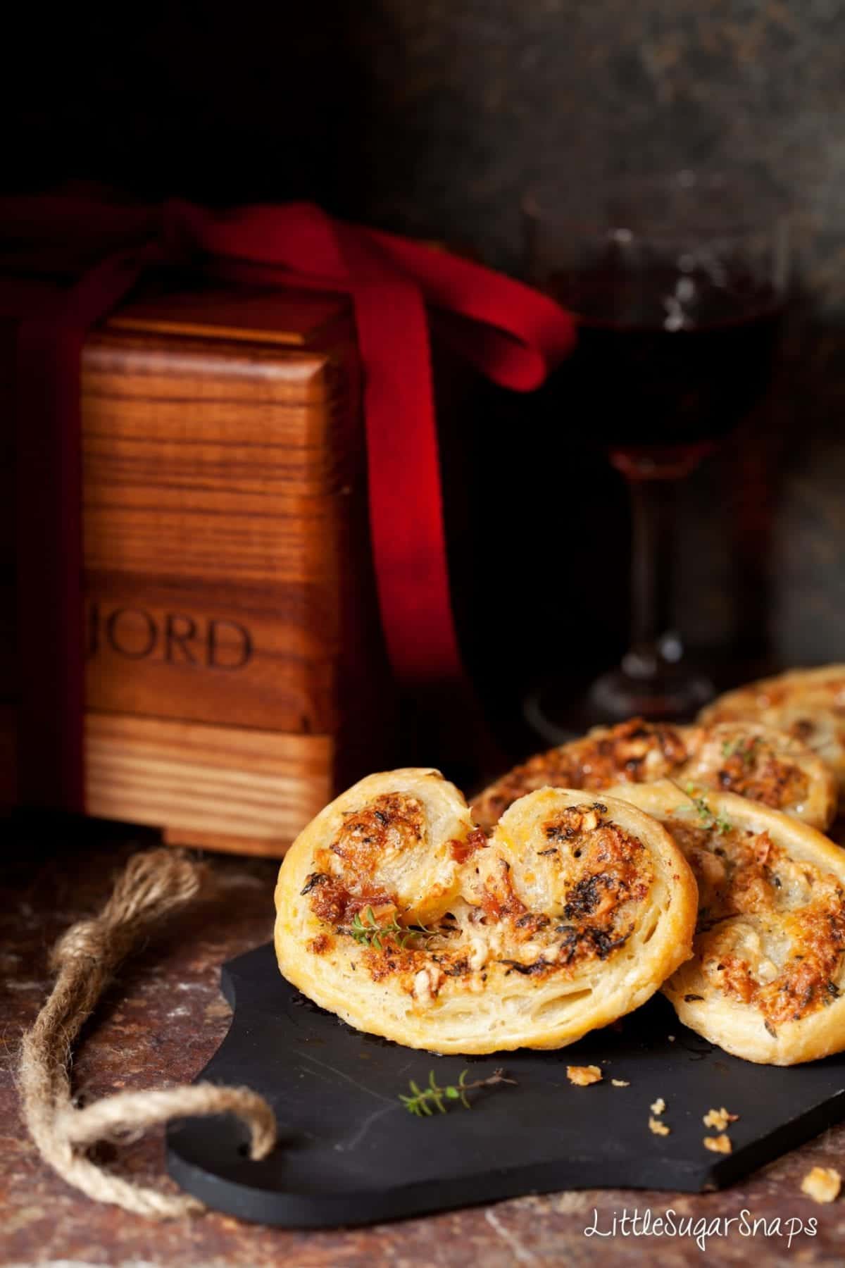 Savoury cheese Palmiers on a black board