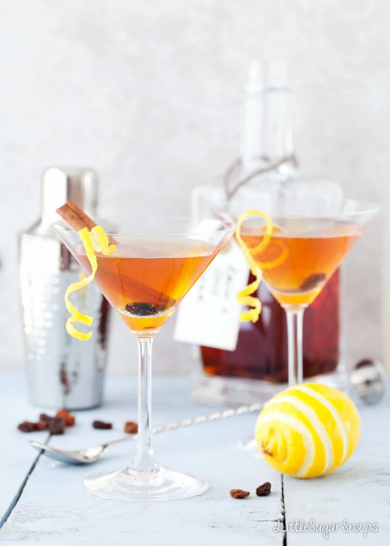 Hot cross bun flavoured Easter martini garnished with lemon, cinnamon and raisins.