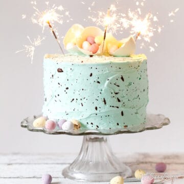 SPECKLED EGG CAKE FOR EASTER DECORATED WITH MINI EGGS AND SPARKLERS