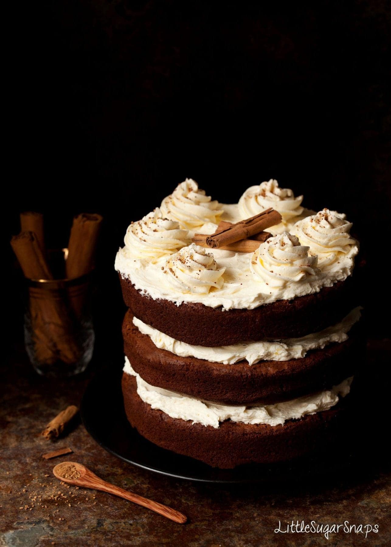 Three layer Cinnamon Chocolate Cake with salted honey buttercream.