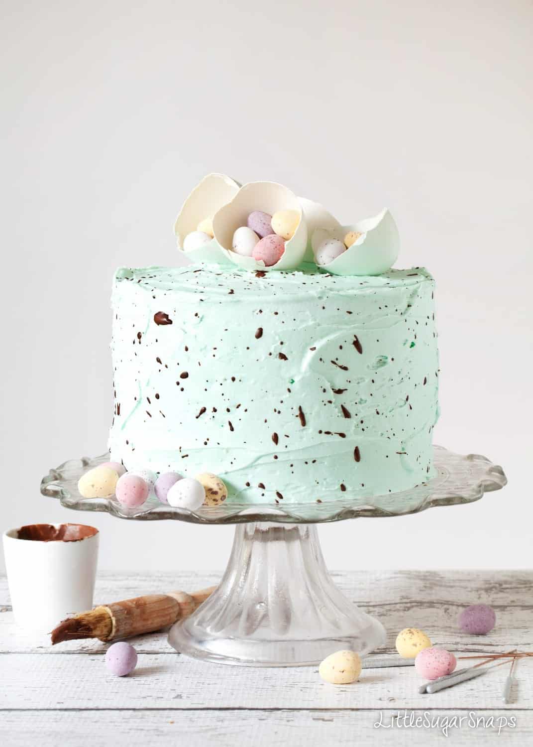 Speckled egg Easter cake recipe decorated with mini eggs