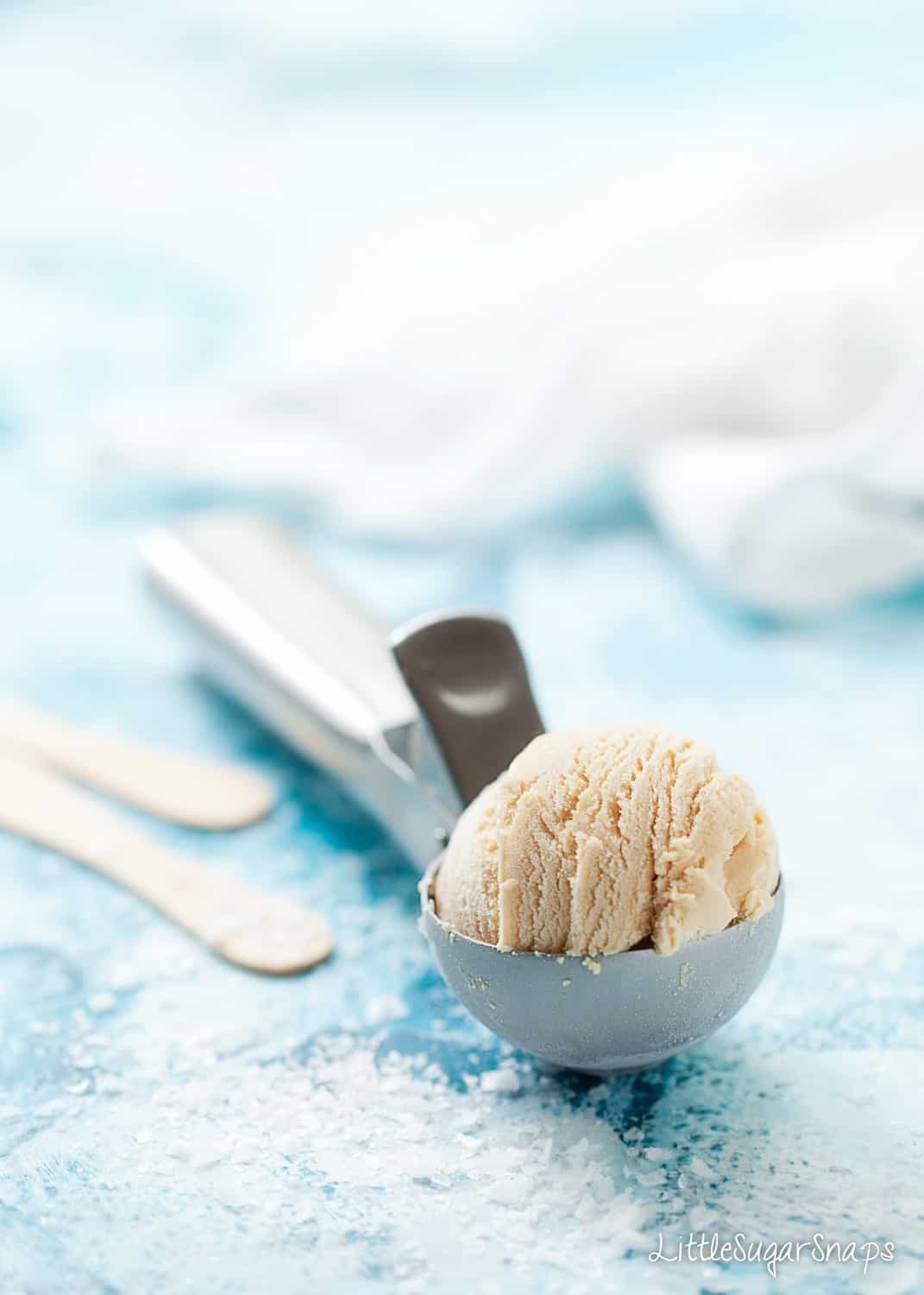 Salted Caramel Ice Cream on a scooper.