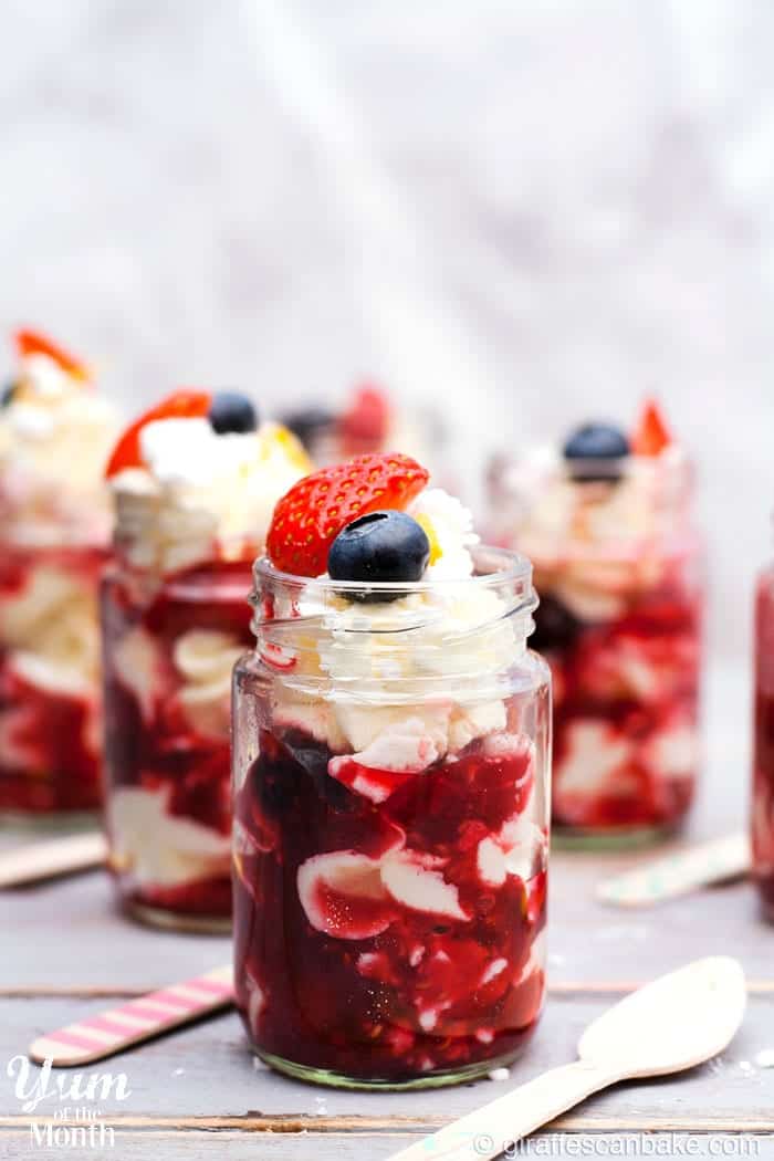 Glass jars of eton mess dessert