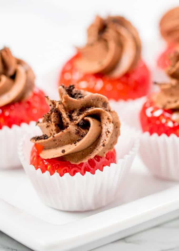 Chocolate cheesecake stuffed strawberries.