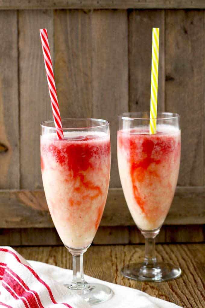 Two alcoholic milkshakes in stemmed glasses