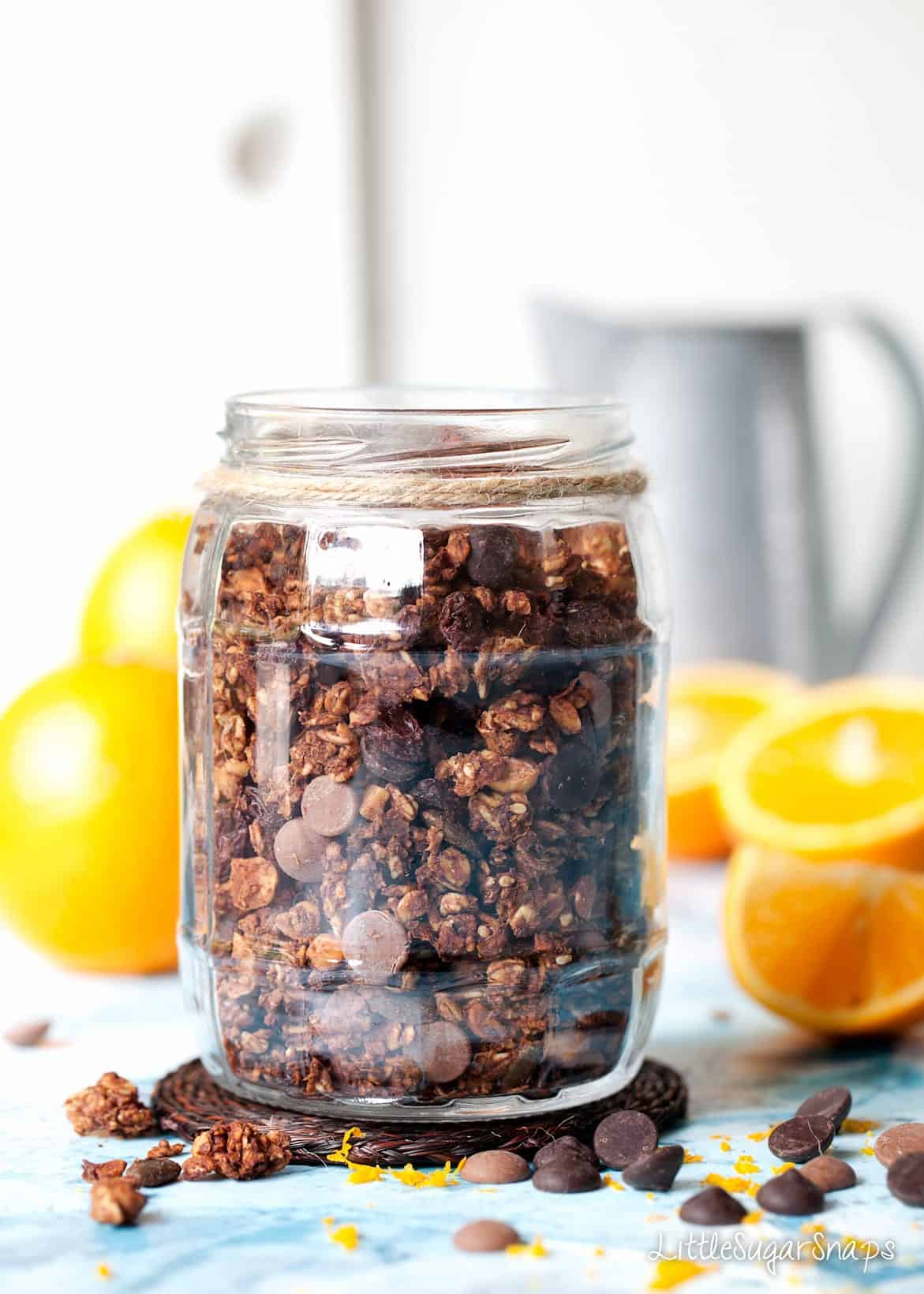 Chocolate Orange Granola in a jar with chocolate chips