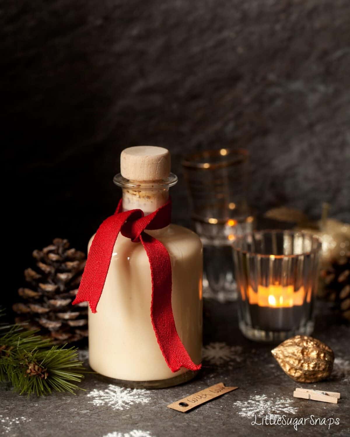 White Chocolate Liqueur in a bottle tied with a red ribbon.