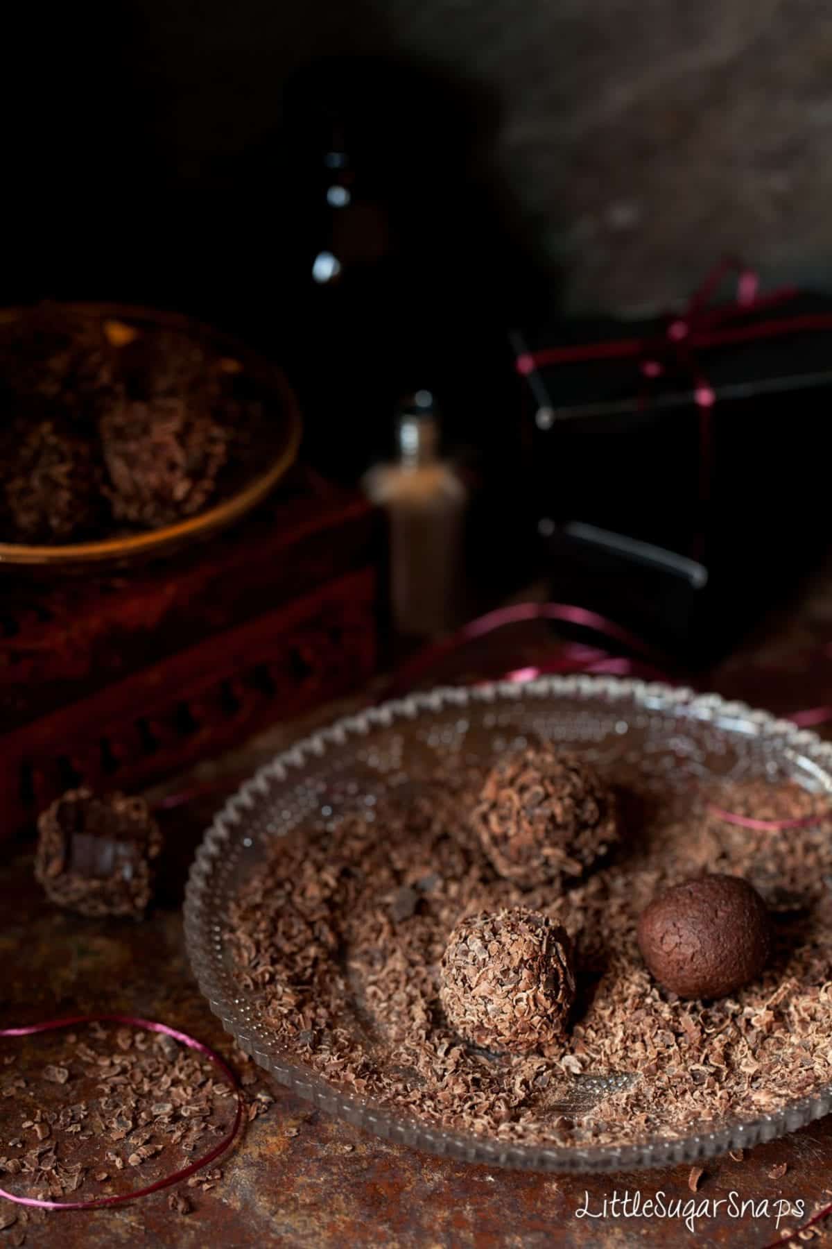 Manhattan Truffles being rolled in grated chocolate.