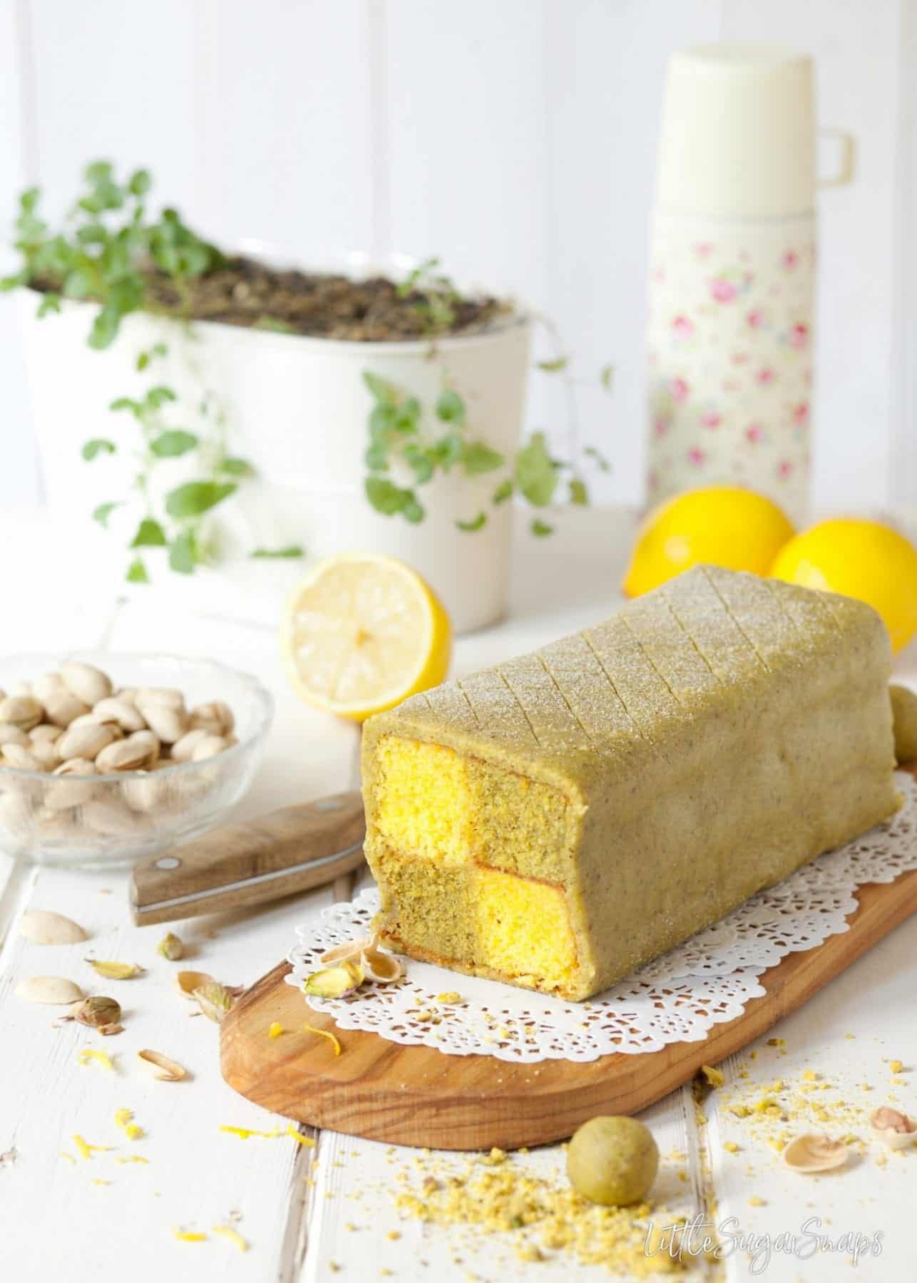 Pistachio and Lemon Battenberg Cake with pistachio marzipan.