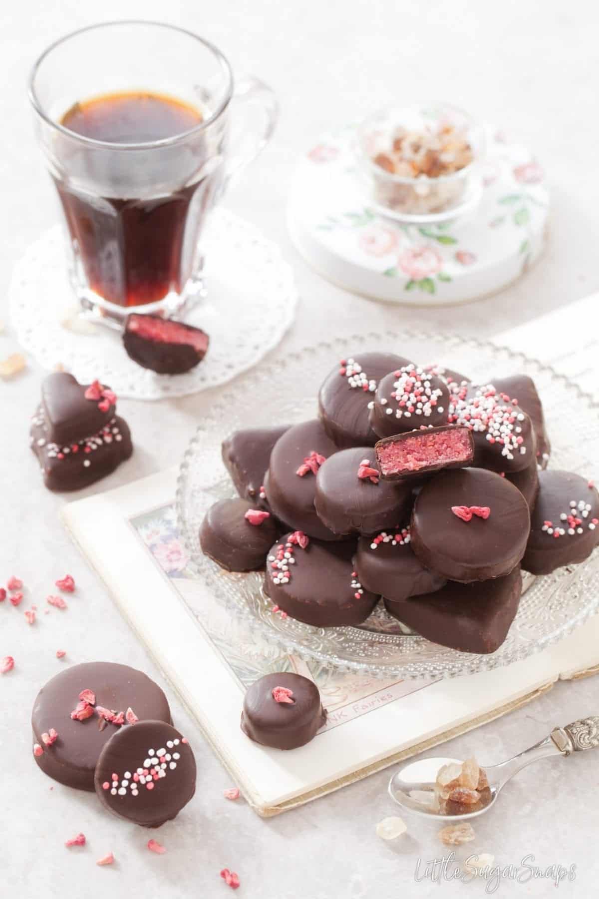 Raspberry Marzipan chocolates topped with pink and white sprinkles.