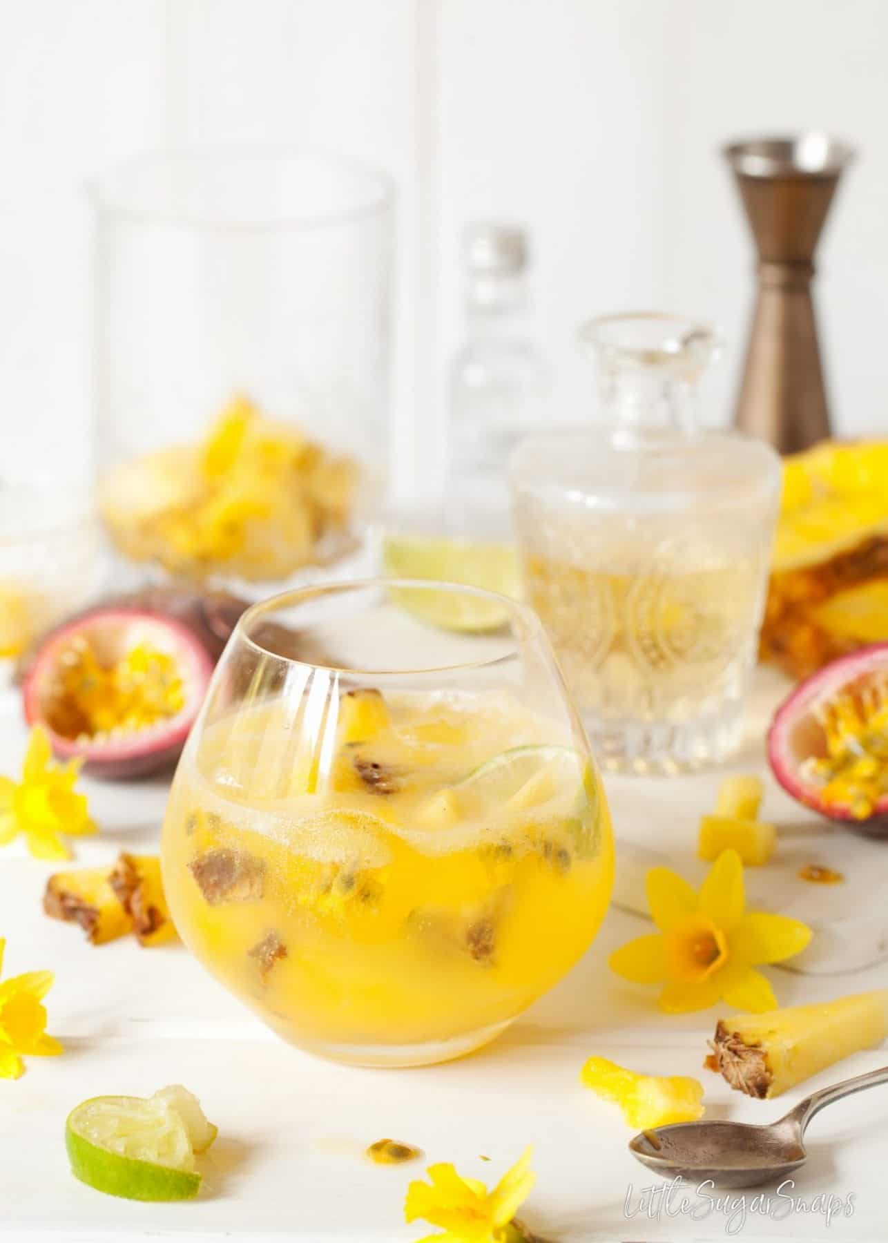 Passionfruit and Pineapple Spring Gin & Tonic in a glass.