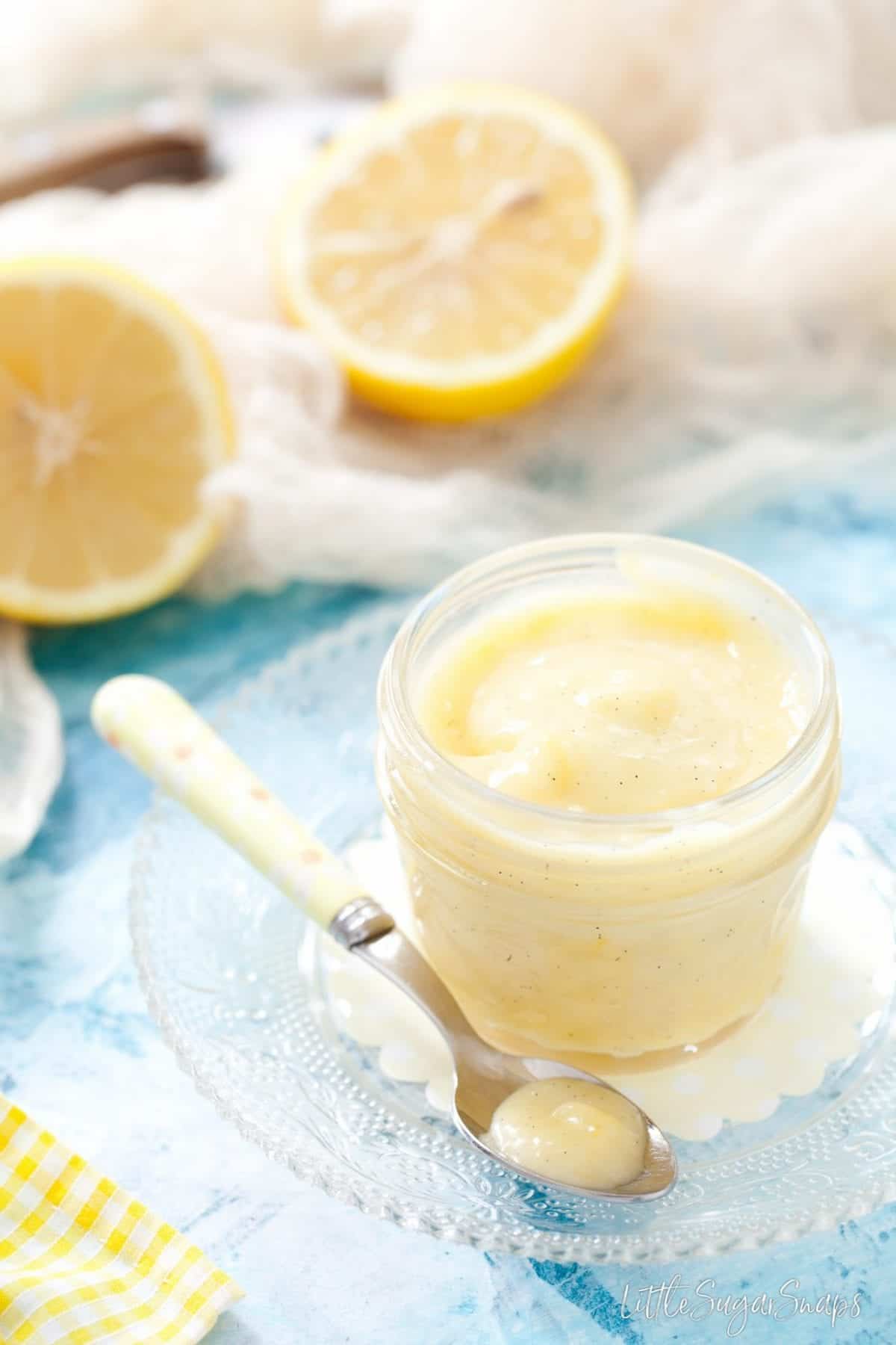 A pot of homemade lemon curd infused with vanilla bean. 