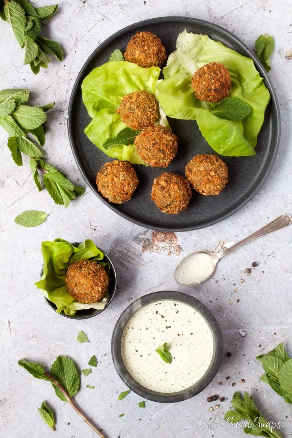 Mint Pea Falafel balls with mint tahini dressing.