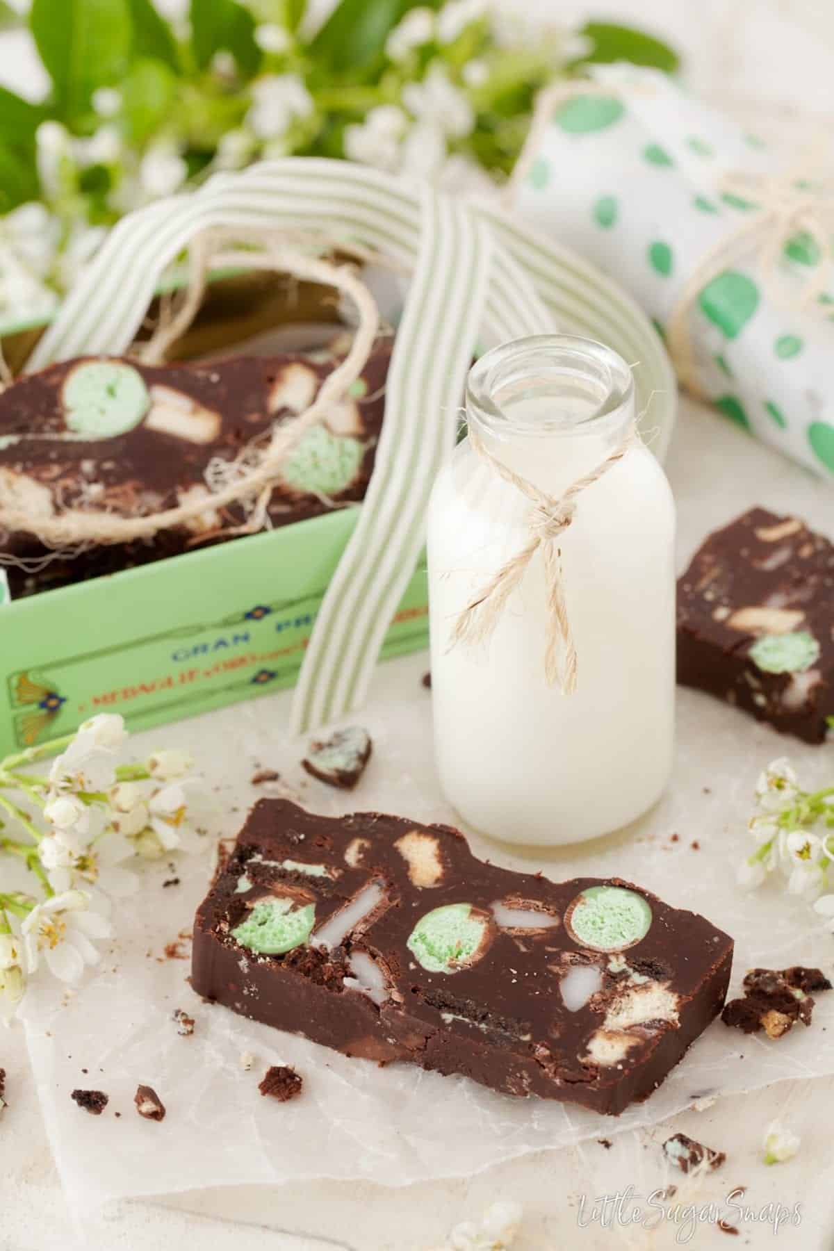 A mint aero slice with a small bottle of mint.