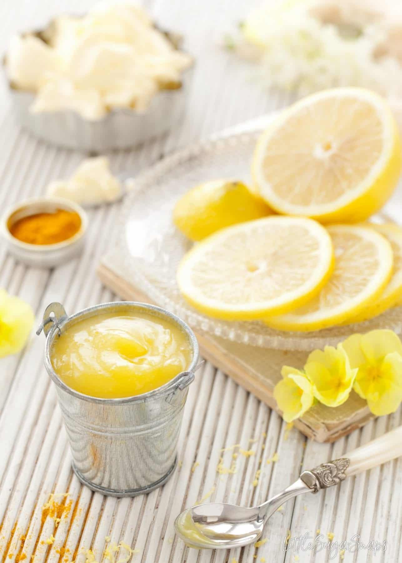 A small aluminium bucket of lemon curd.