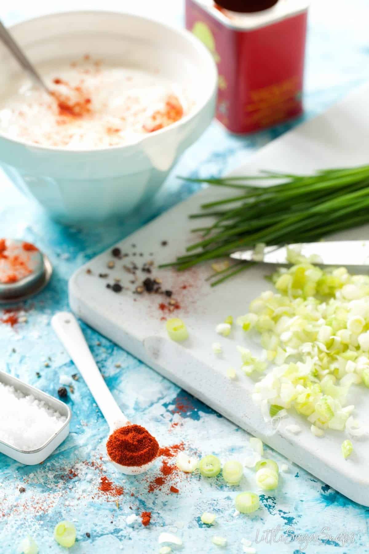 Preparing ingredients for paprika dip.