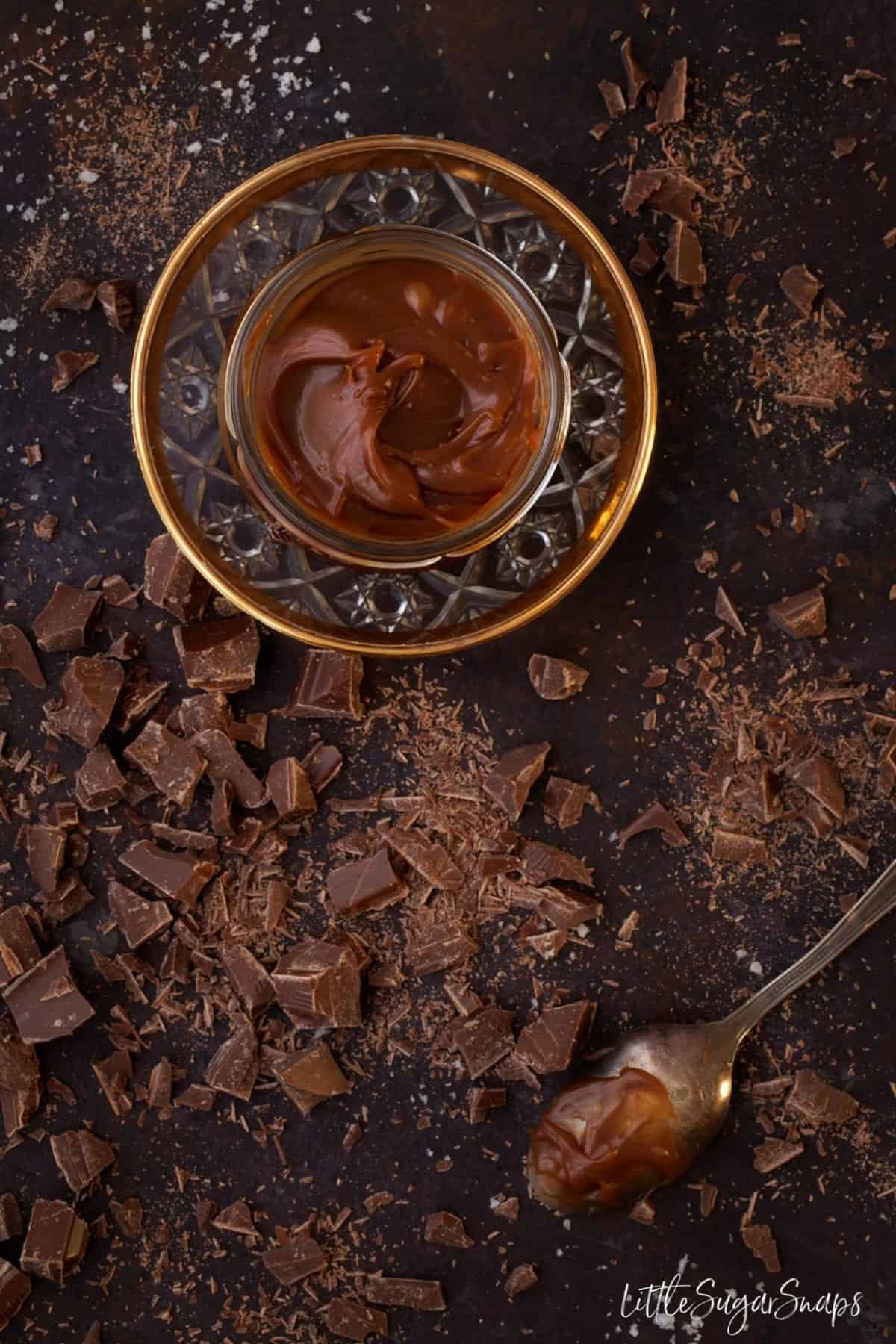 A pot of Chocolate Caramel Spread and chopped chocolate alongside.