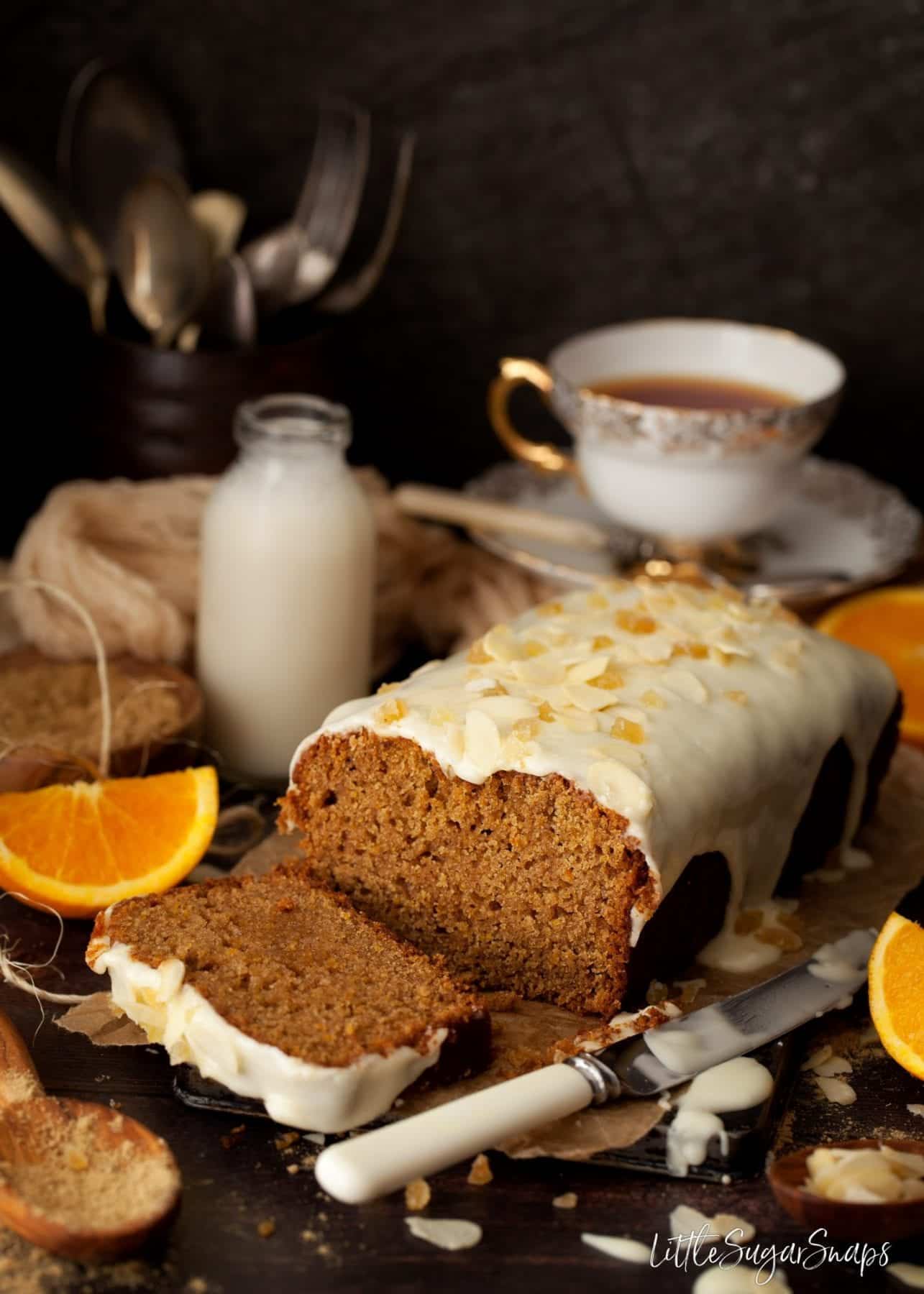 Freshly cut sweet loaf cake served with tea