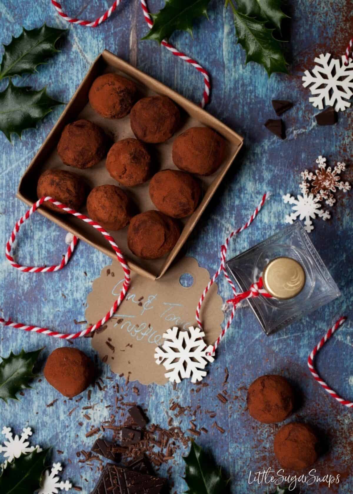 Gin and Tonic Truffles in a gift box with a mini bottle of gin.