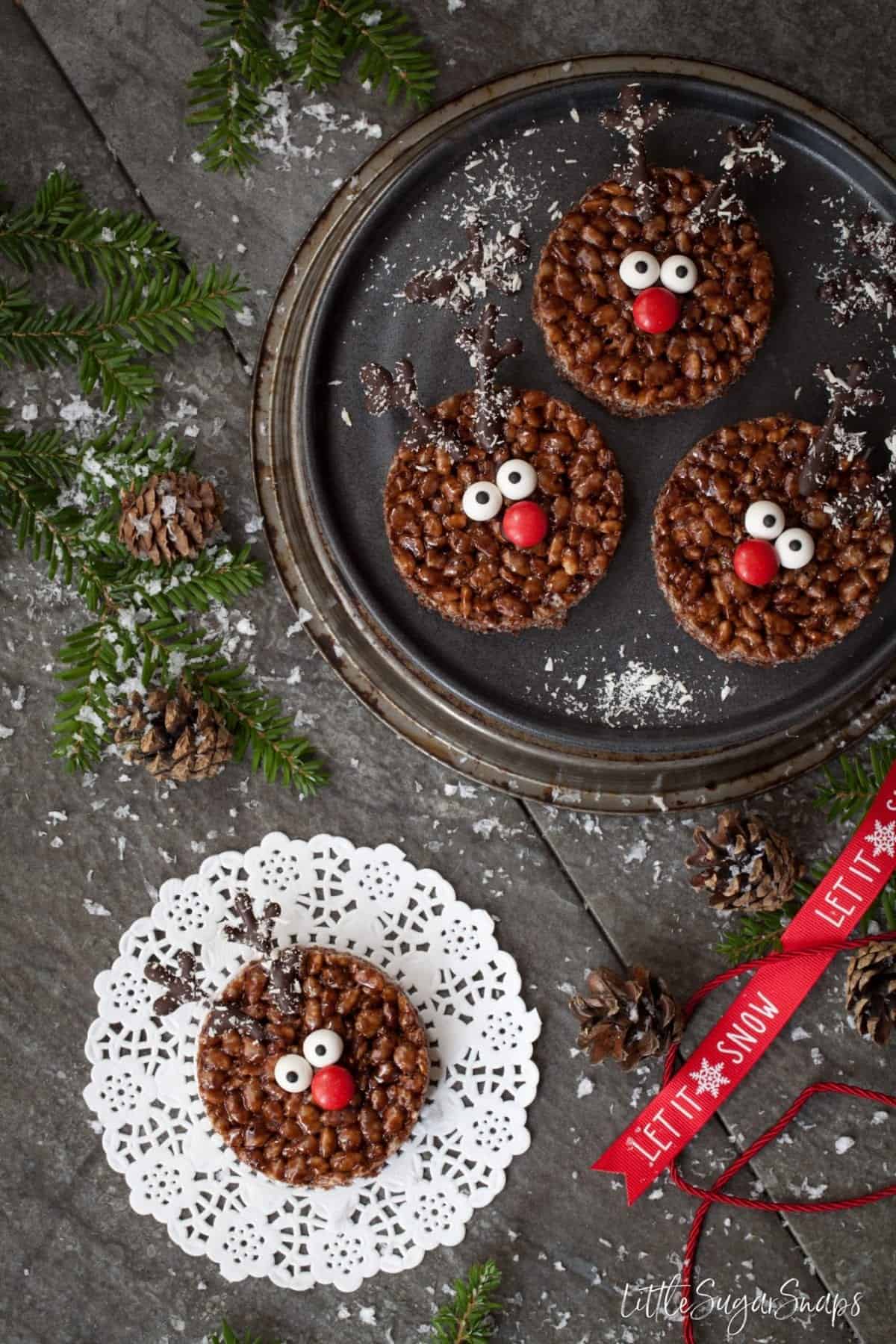 Chocolate Rice Krispie Treats with a festive theme - presented as Rudolph faces.