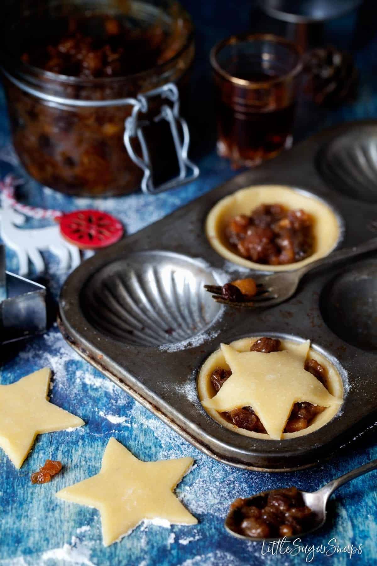 Gluten Free Mince Pies being made and placed in a vintage baking tin ready to cook